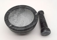 Almofariz de pedra preto do almofariz e do pilão, o de mármore e forma redonda ajustada do pilão
